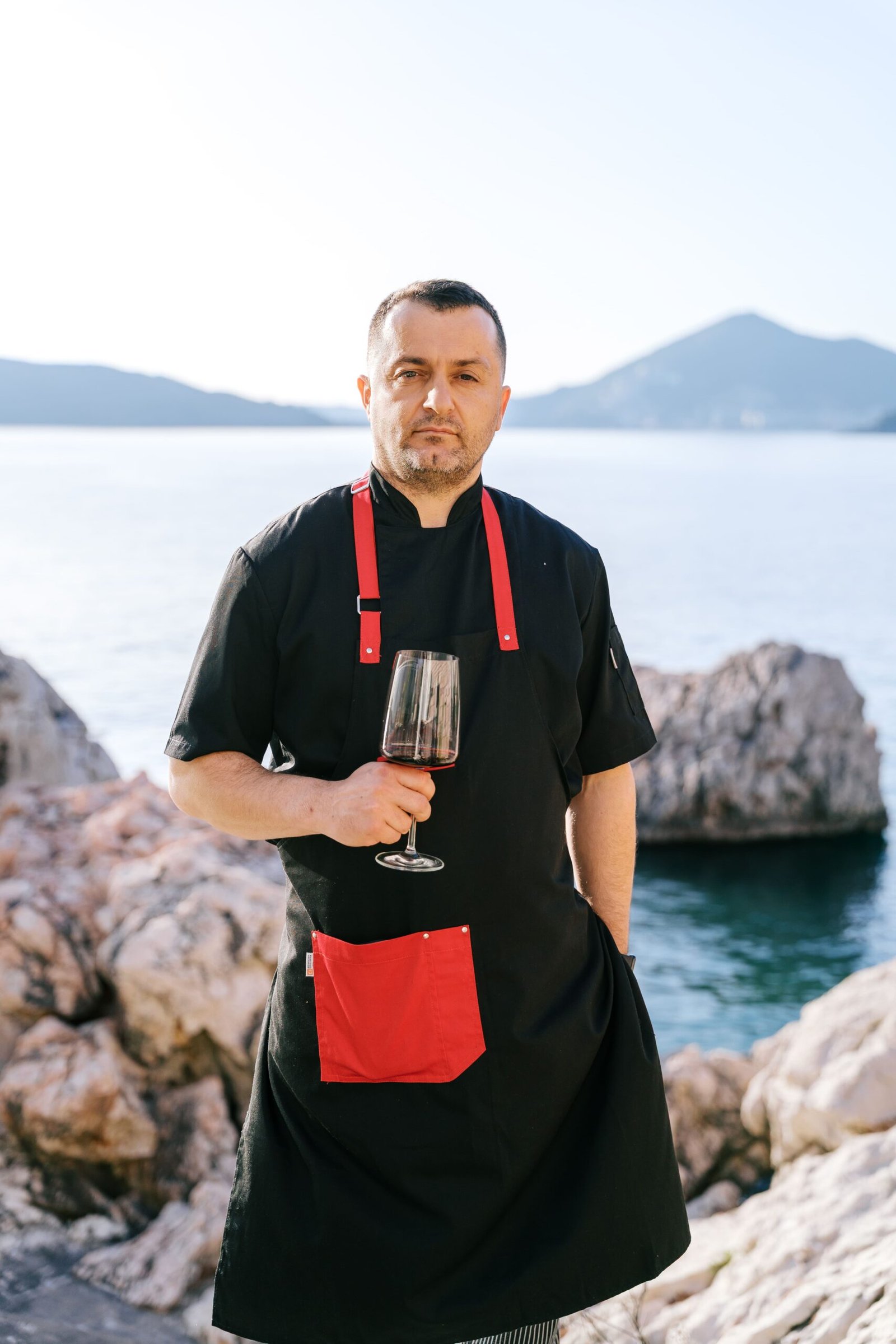 Milisav Pižurica, Head Chef of Pietra, on the rocks above the Adriatic in Pržno